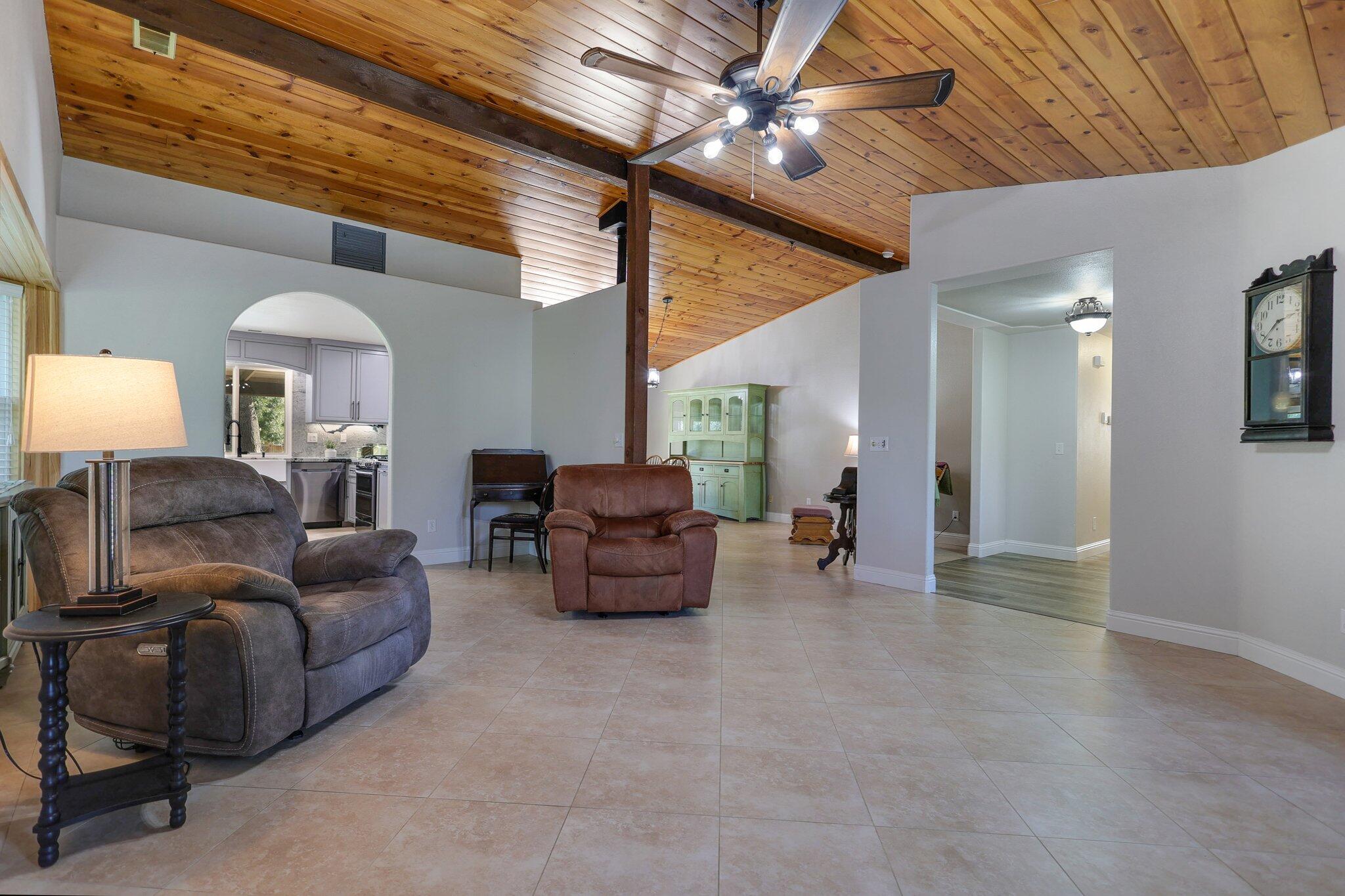 21365 Dersch Road Anderson, CA 96007 - Photo 8 of 55 a living room with furniture and a chandelier