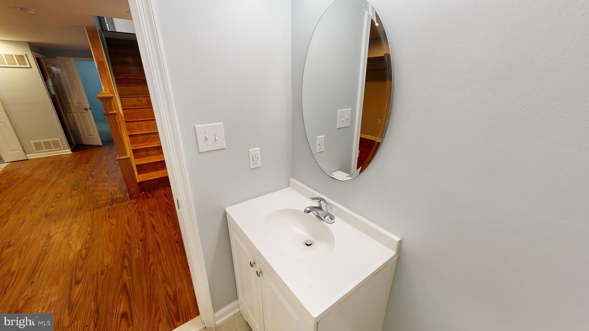 1826 North Caroline Street Baltimore, MD 21213 - Photo 22 of 59 Vanity in the basement