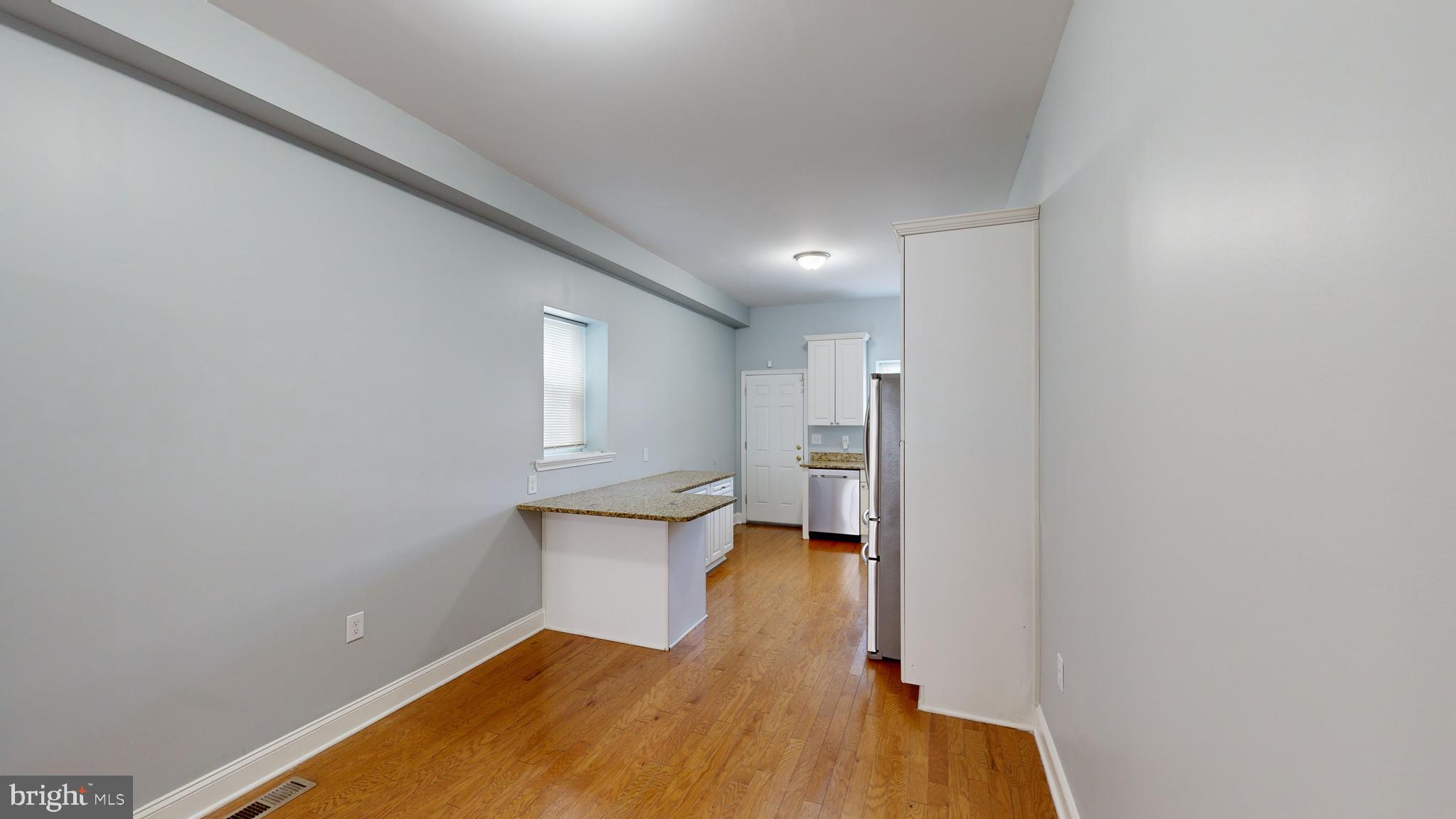 1826 North Caroline Street Baltimore, MD 21213 - Photo 28 of 59 Dining area and 2 seat counter seating space