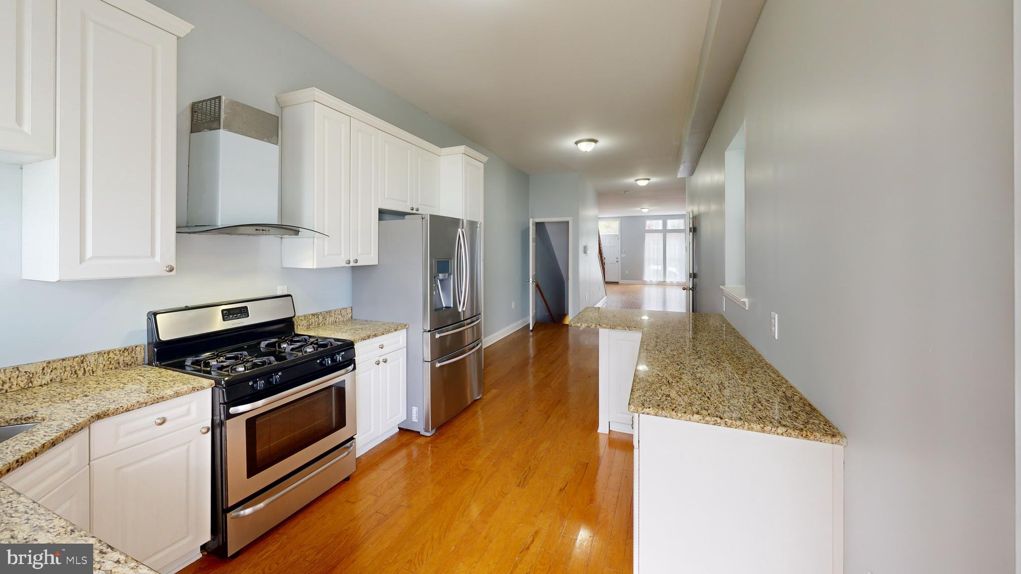 1826 North Caroline Street Baltimore, MD 21213 - Photo 4 of 59 Main floor view to living dining area