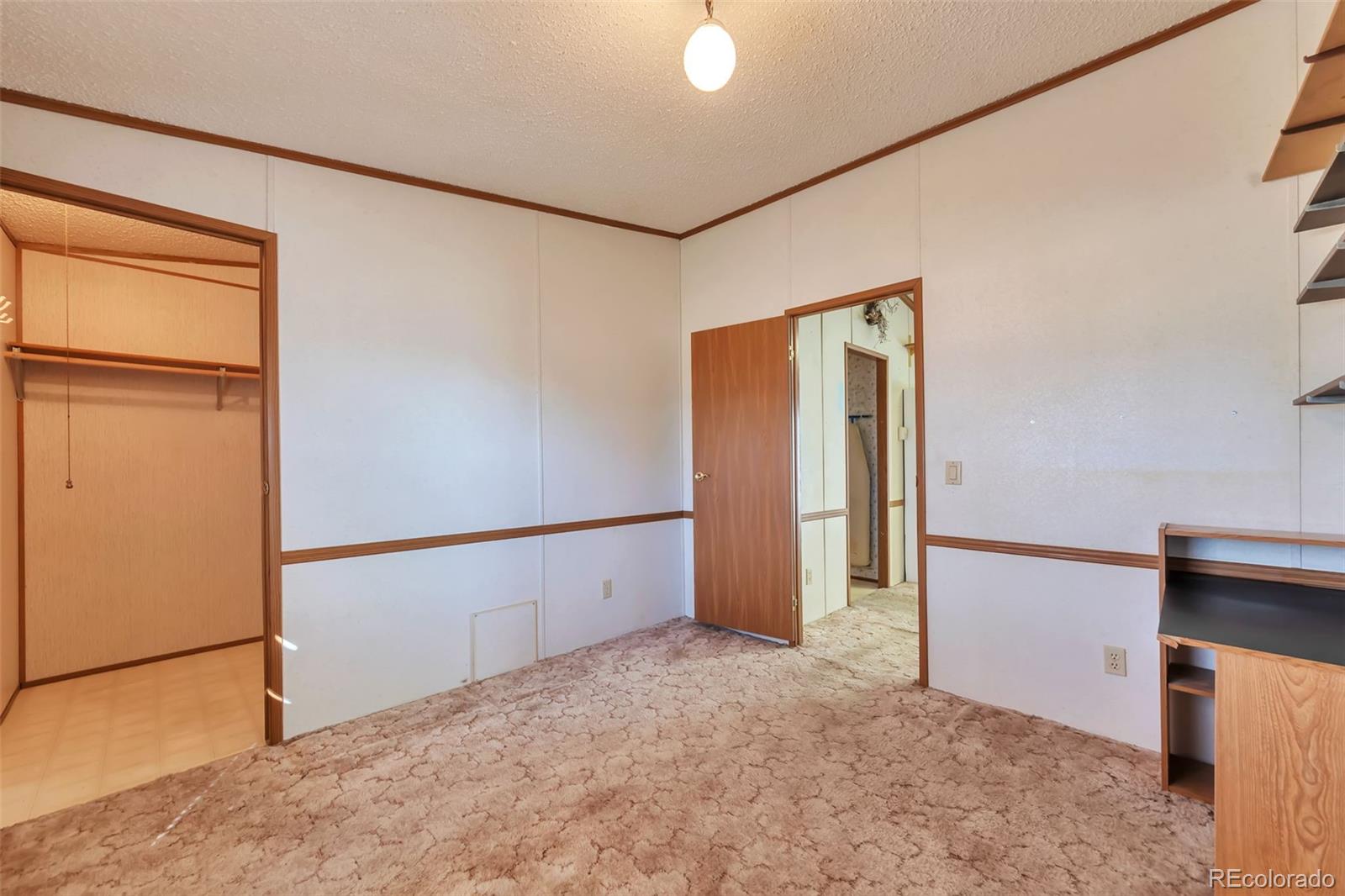 7702 Hart Street Fort Lupton, CO 80621 - Photo 18 of 25 a view of an empty room
