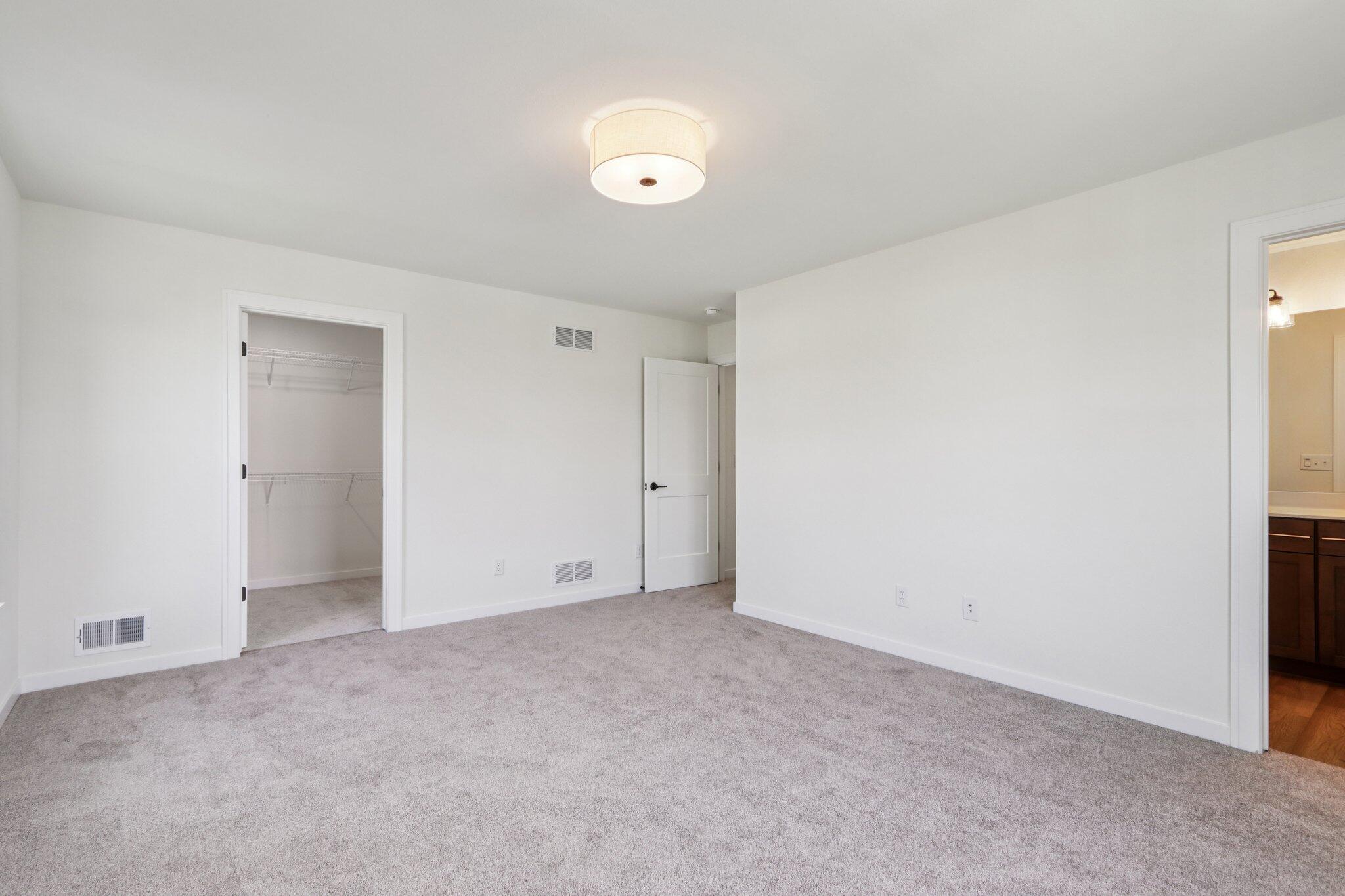 665 Mary Way Slinger, WI 53086 - Photo 12 of 27 665 Mary Way 12 Primary Bedroom