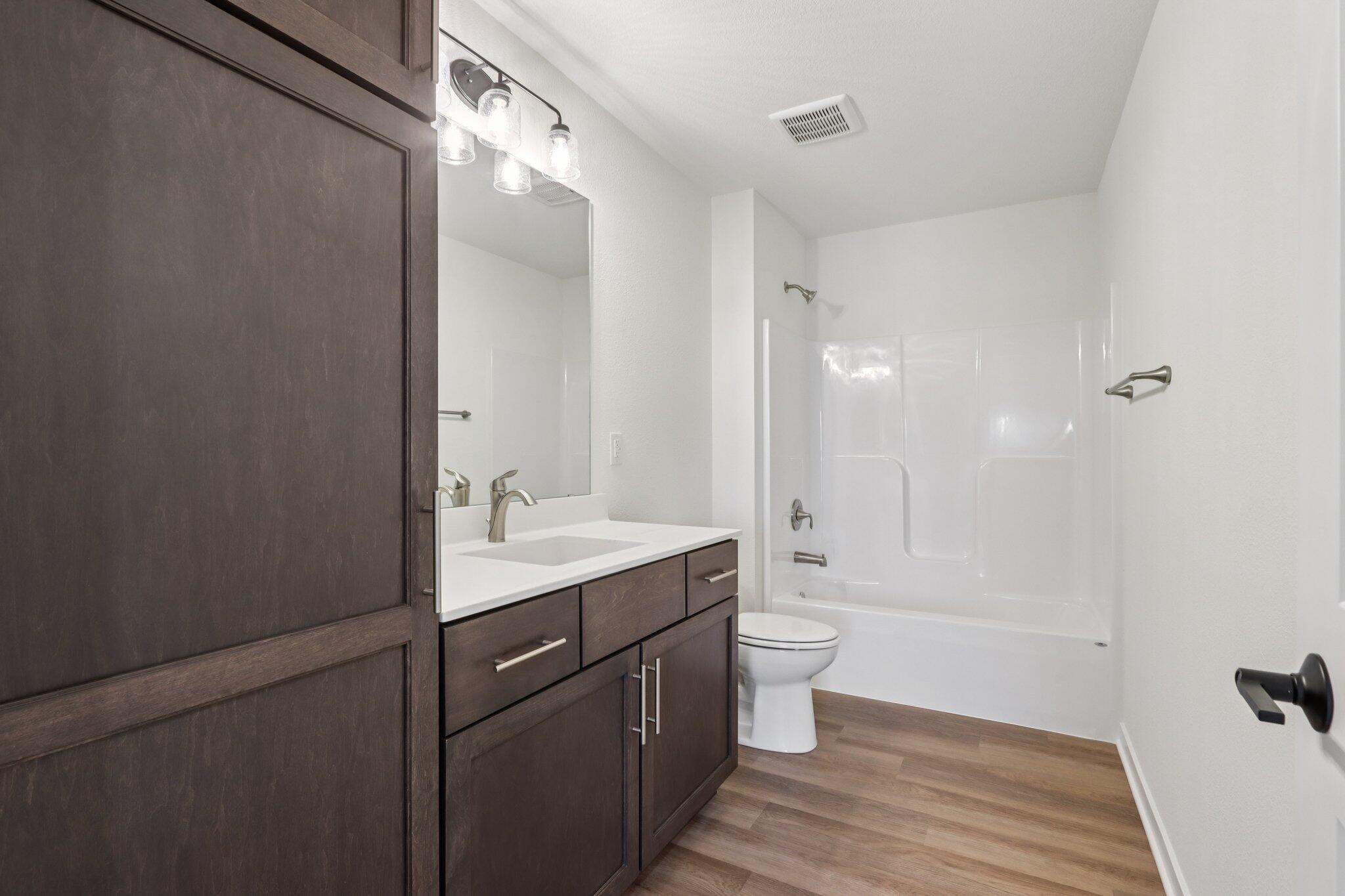 665 Mary Way Slinger, WI 53086 - Photo 20 of 27 665 Mary Way 20 Hall Bathroom