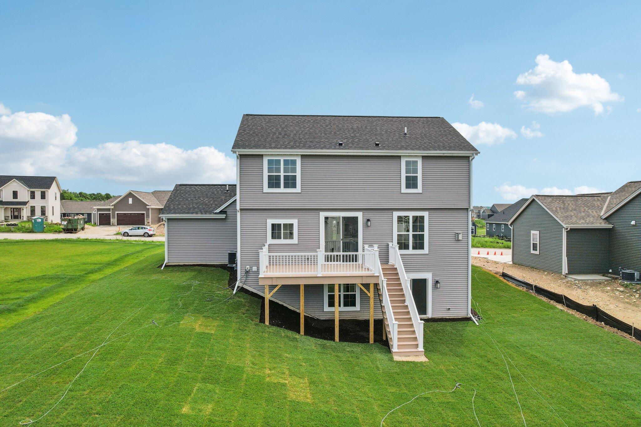 665 Mary Way Slinger, WI 53086 - Photo 24 of 27 665 Mary Way 24 Rear of Home