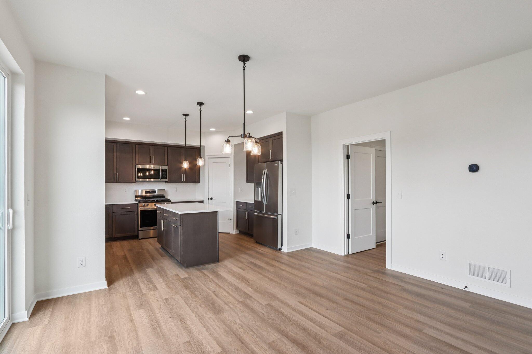 665 Mary Way Slinger, WI 53086 - Photo 8 of 27 665 Mary Way 08 Dining and Kitchen