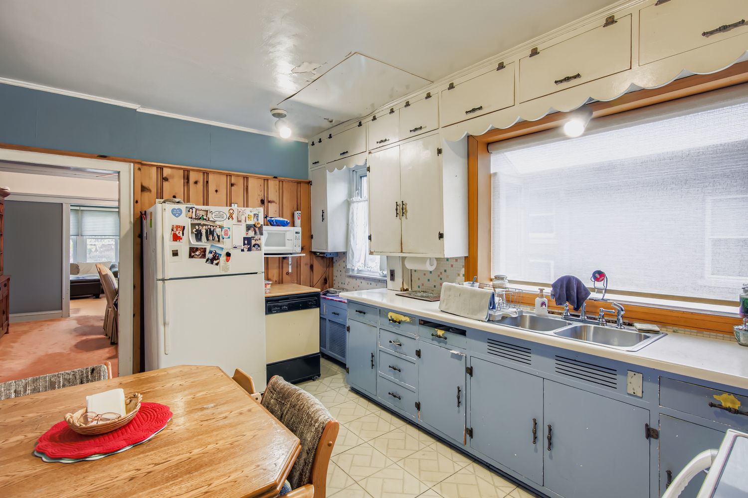 10522 South Leavitt Street Chicago, IL 60643 - Photo 12 of 24 a kitchen with sink refrigerator and cabinets
