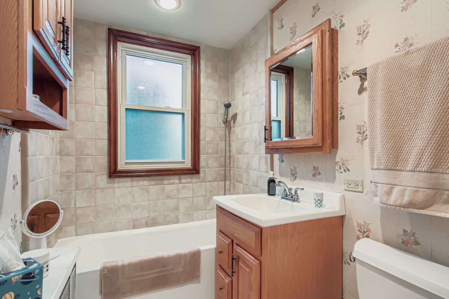 10522 South Leavitt Street Chicago, IL 60643 - Photo 16 of 24 a bathroom with a sink and a mirror