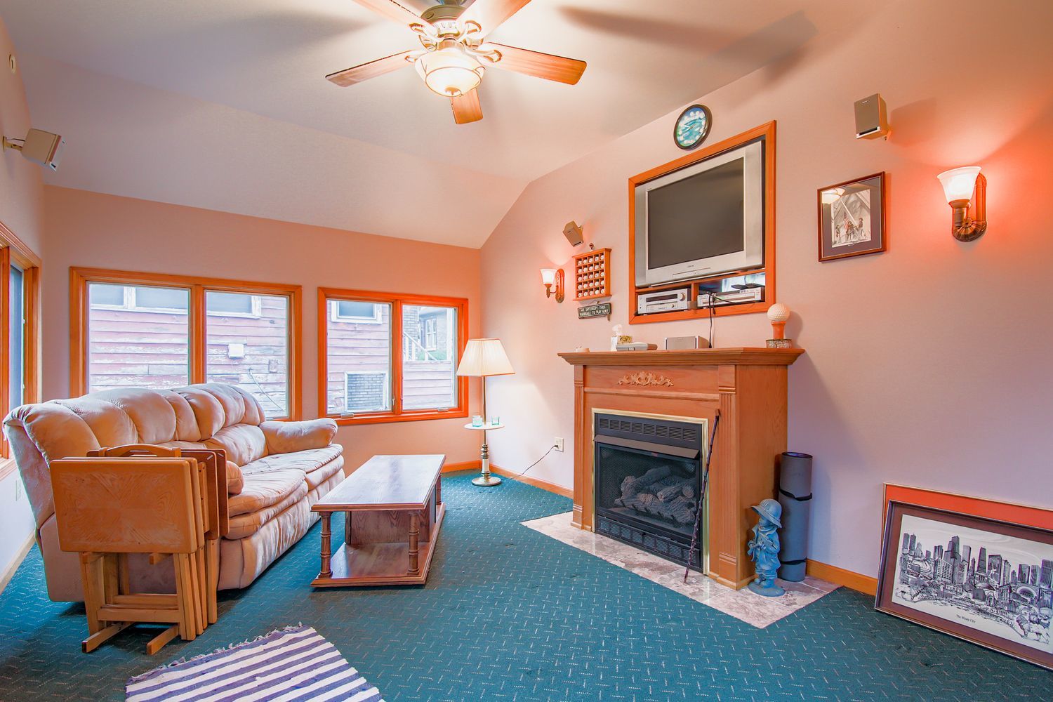 10522 South Leavitt Street Chicago, IL 60643 - Photo 18 of 24 a living room with furniture a flat screen tv and a fireplace
