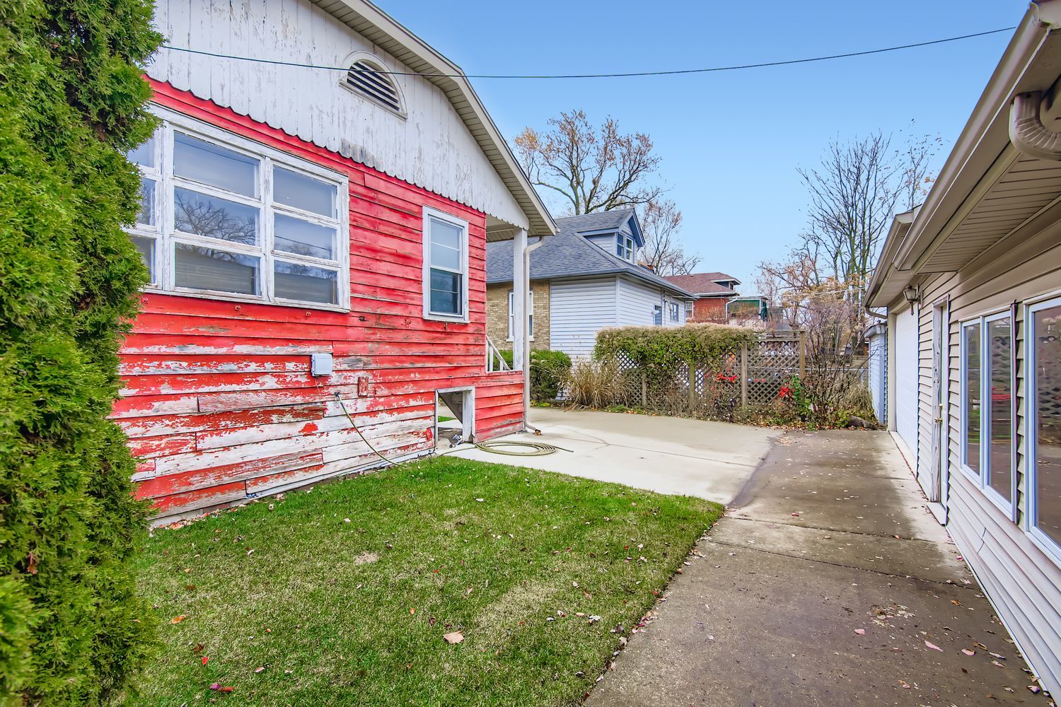 10522 South Leavitt Street Chicago, IL 60643 - Photo 21 of 24 a front view of a house with a yard and garage