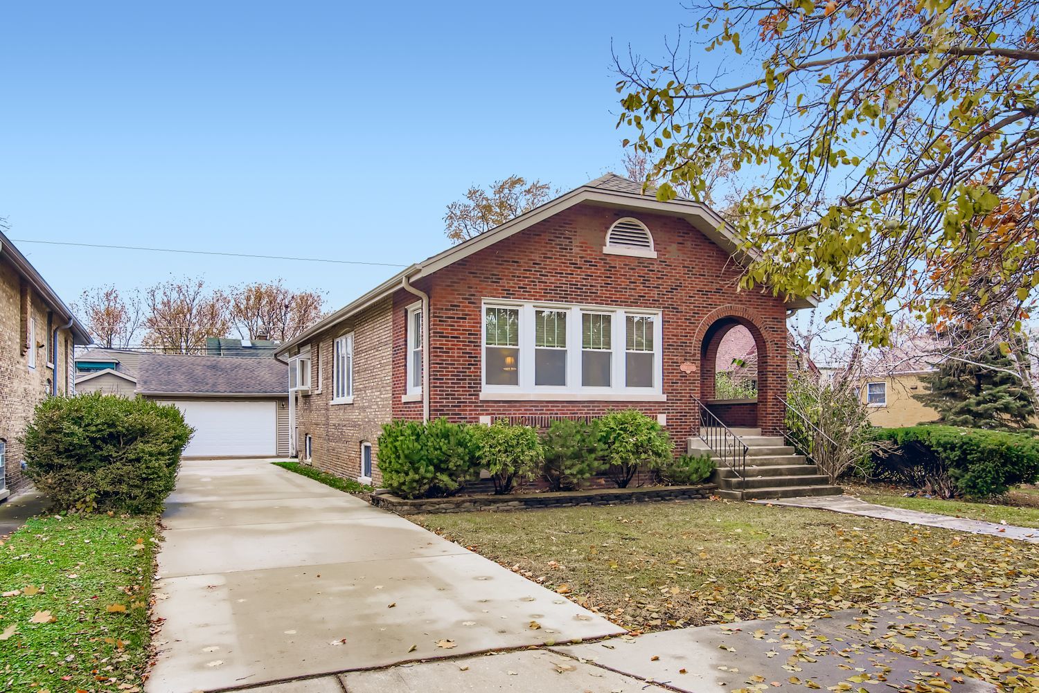 10522 South Leavitt Street Chicago, IL 60643 - Photo 4 of 24 a front view of a house with a yard
