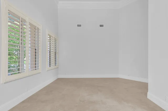 a kitchen with stainless steel appliances a refrigerator sink and cabinets