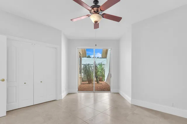 a view of outdoor space with a big yard