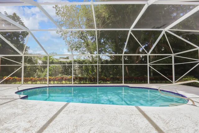 an aerial view of house with yard