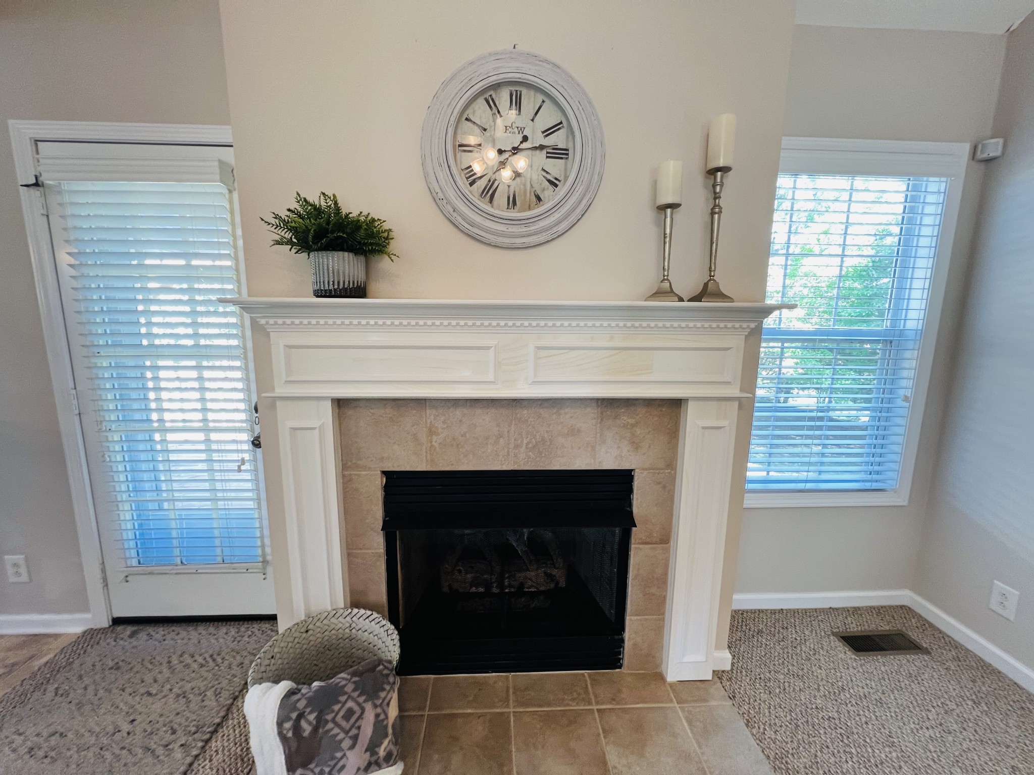 364 Dixie Lane Pleasant View, TN 37146 - Photo 14 of 45 a living room with a fireplace and a window