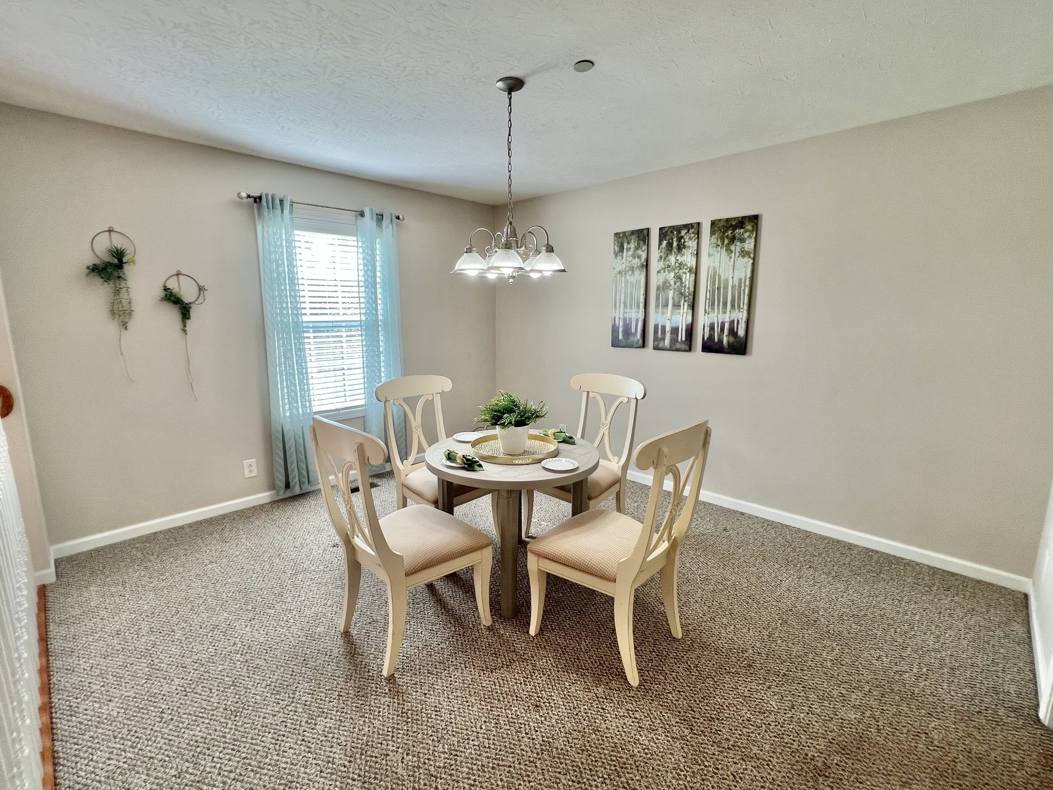 364 Dixie Lane Pleasant View, TN 37146 - Photo 16 of 45 a dining room with furniture a chandelier and window