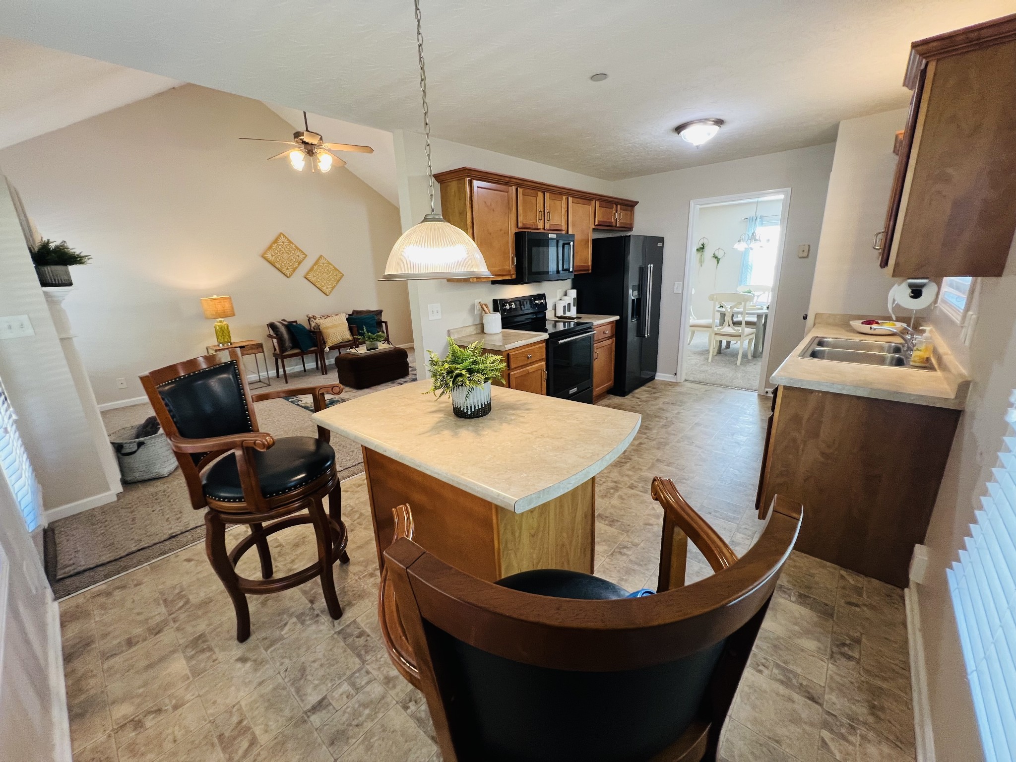 364 Dixie Lane Pleasant View, TN 37146 - Photo 23 of 45 a living room with furniture a fireplace and a flat screen tv