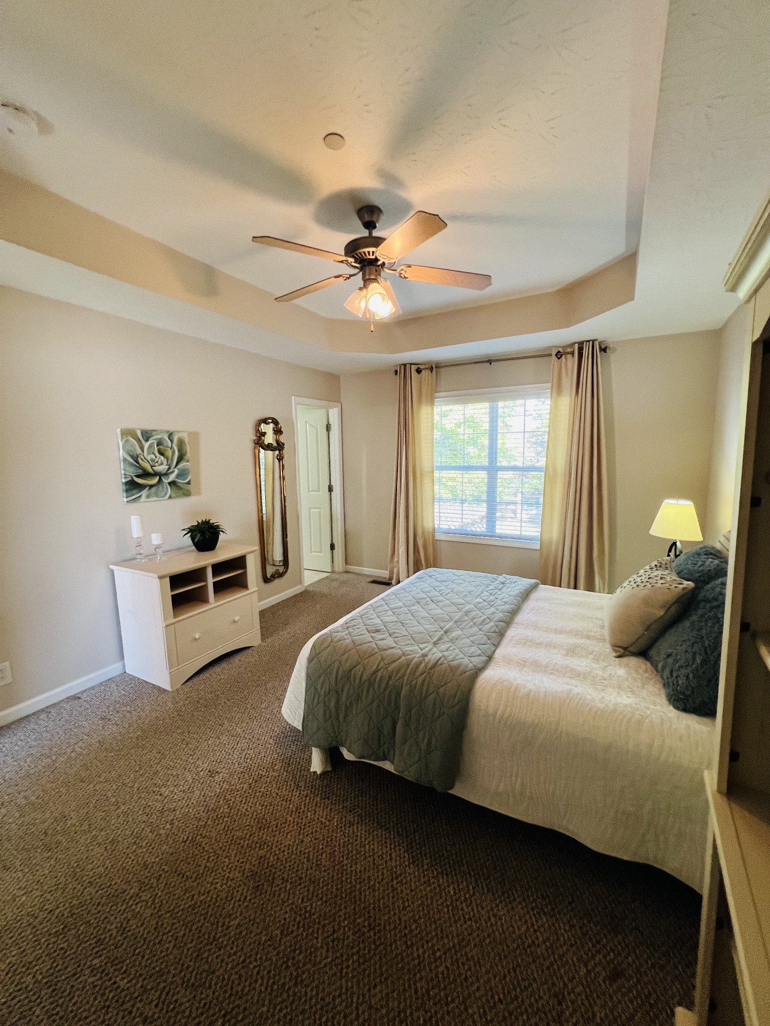 364 Dixie Lane Pleasant View, TN 37146 - Photo 25 of 45 a bedroom with a bed dresser and window