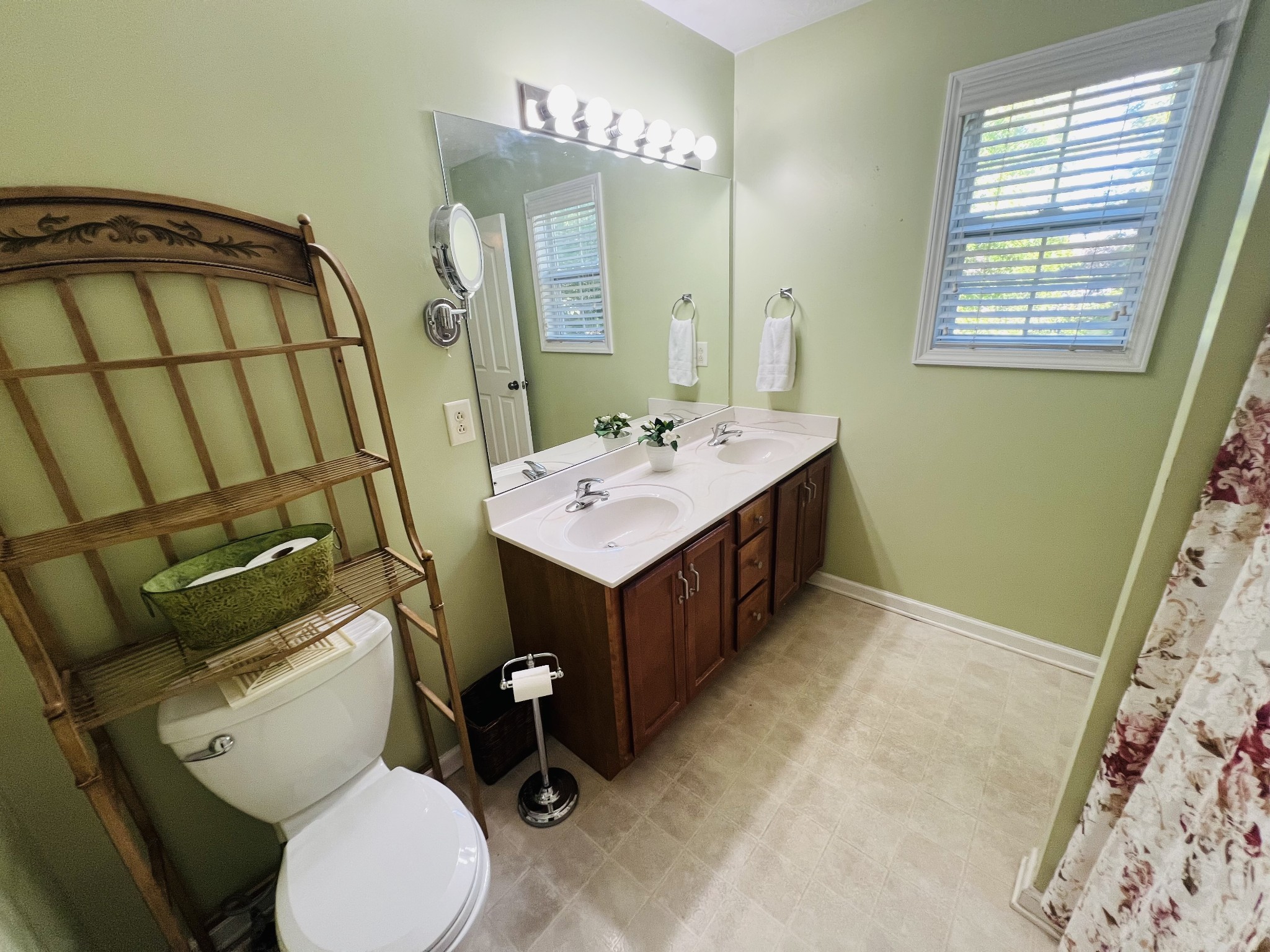 364 Dixie Lane Pleasant View, TN 37146 - Photo 27 of 45 a bathroom with a sink mirror vanity and toilet