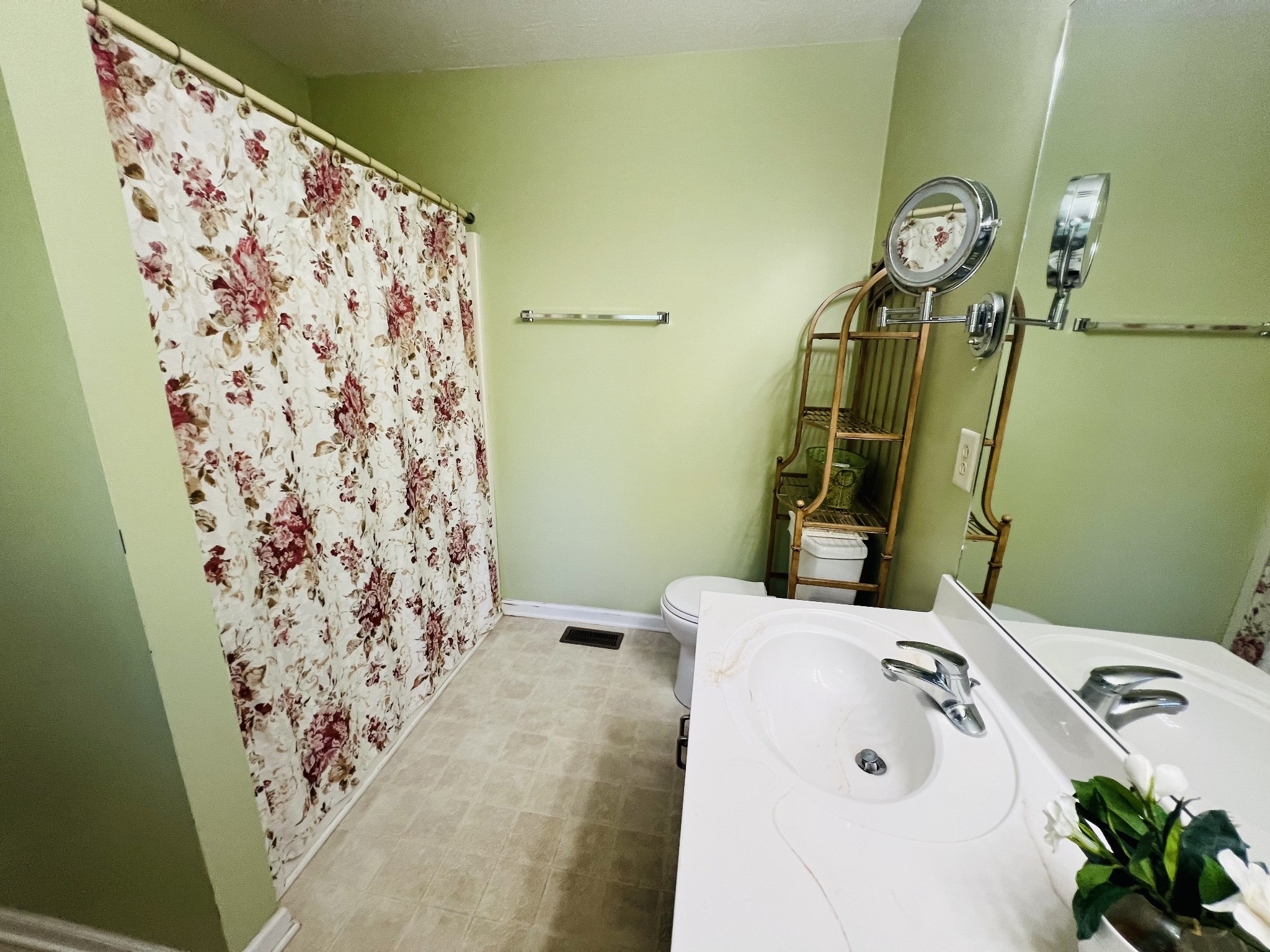 364 Dixie Lane Pleasant View, TN 37146 - Photo 28 of 45 a bathroom with a sink and a mirror