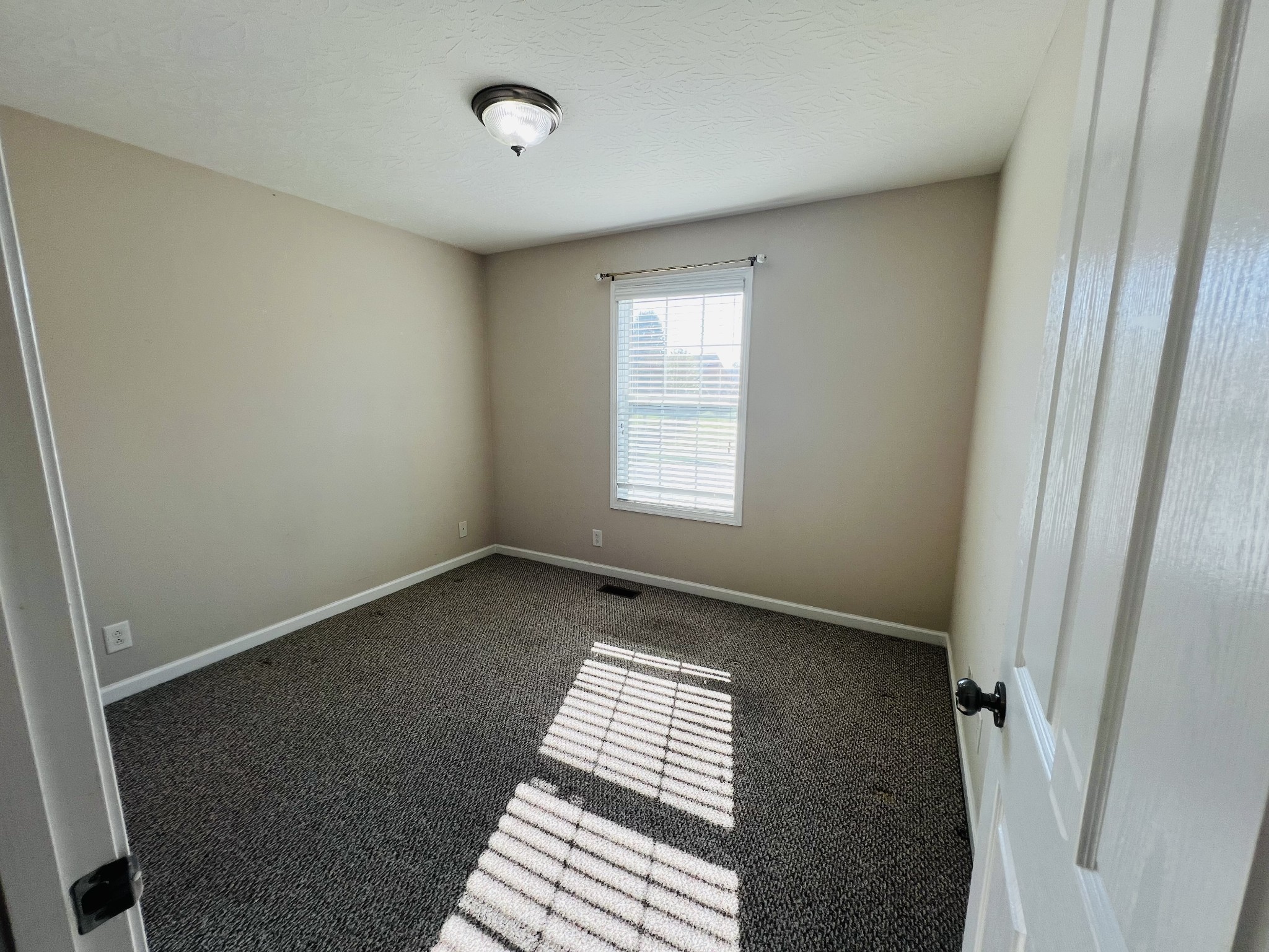 364 Dixie Lane Pleasant View, TN 37146 - Photo 32 of 45 a view of an empty room and window