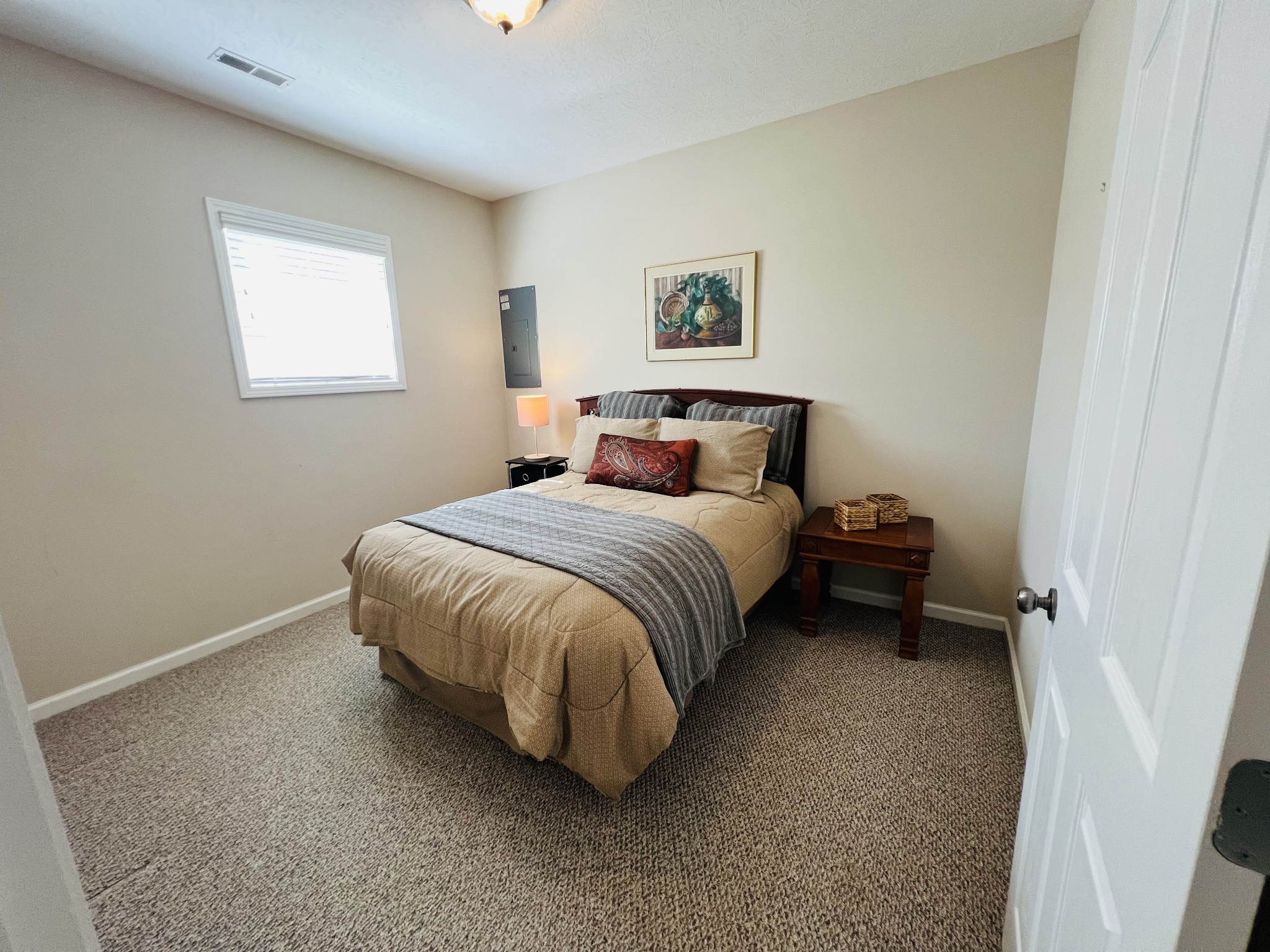 364 Dixie Lane Pleasant View, TN 37146 - Photo 42 of 45 a spacious bedroom with a bed and a window