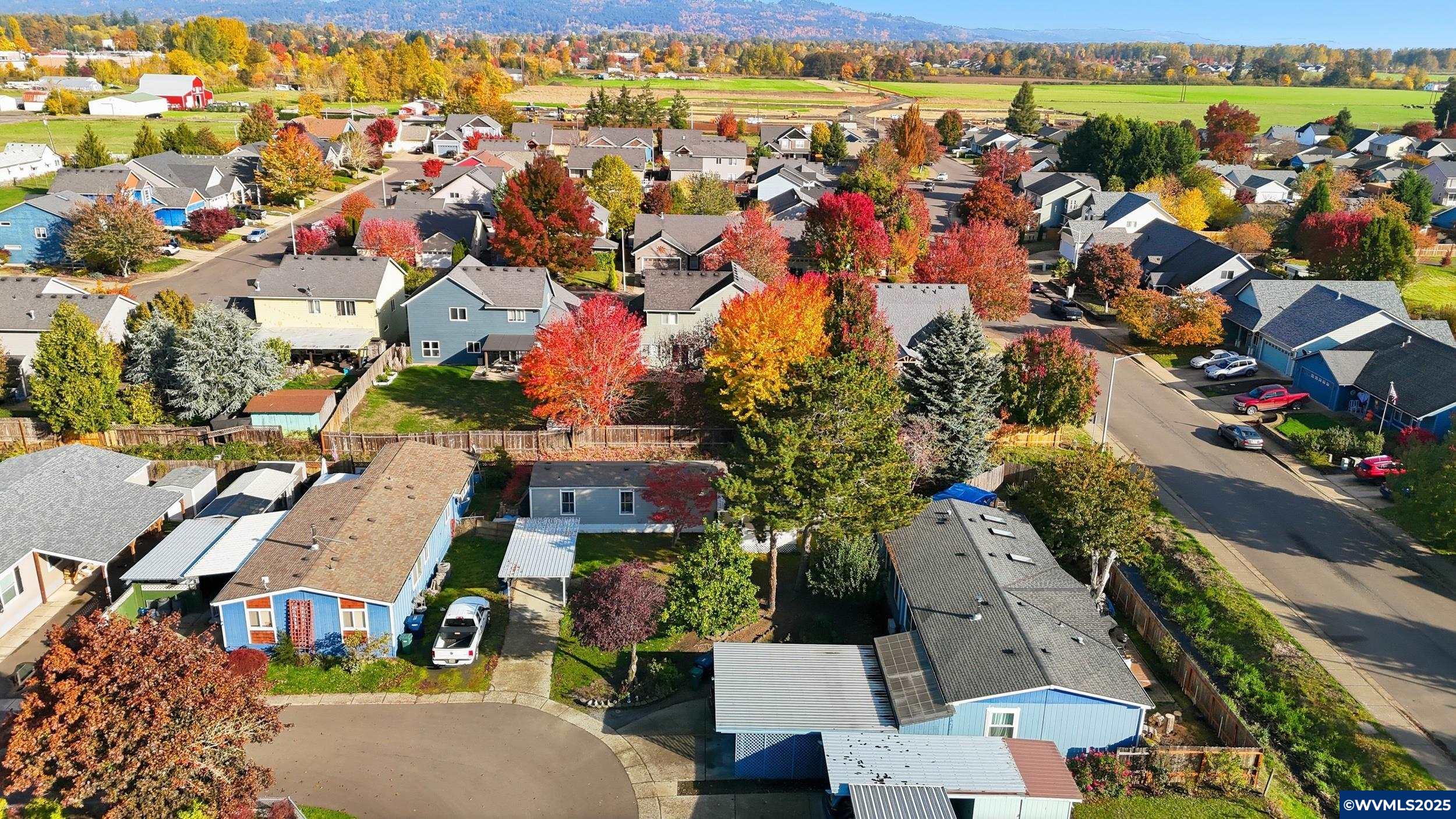 277 Edwards Road, Unit 145 Monmouth, OR 97361 - Photo 42 of 47 an aerial view of residential houses with outdoor space