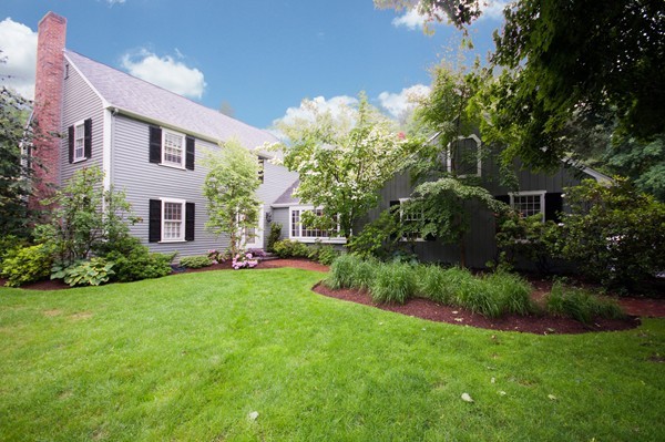 3 Decatur Lane Wayland, MA 01778 - Photo 1 of 15 a view of a brick house with a yard and plants