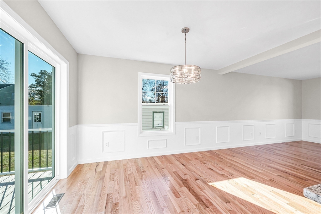 39 Wallace Street Springfield, MA 01119 - Photo 15 of 41 a view of empty room with wooden floor and fan