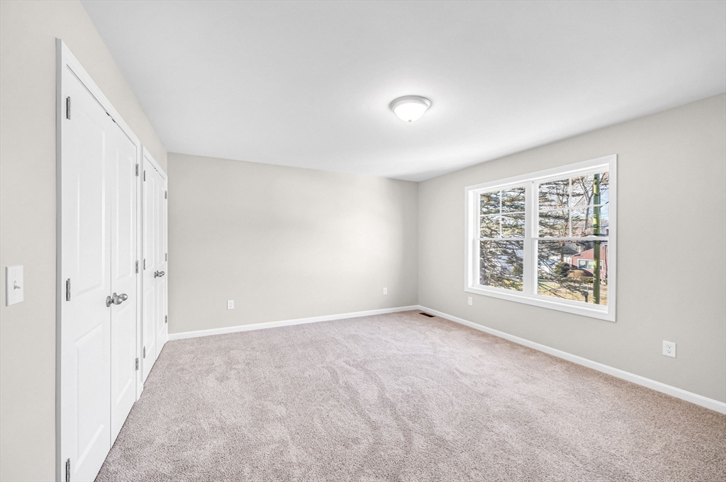 39 Wallace Street Springfield, MA 01119 - Photo 24 of 41 a view of an empty room with a window