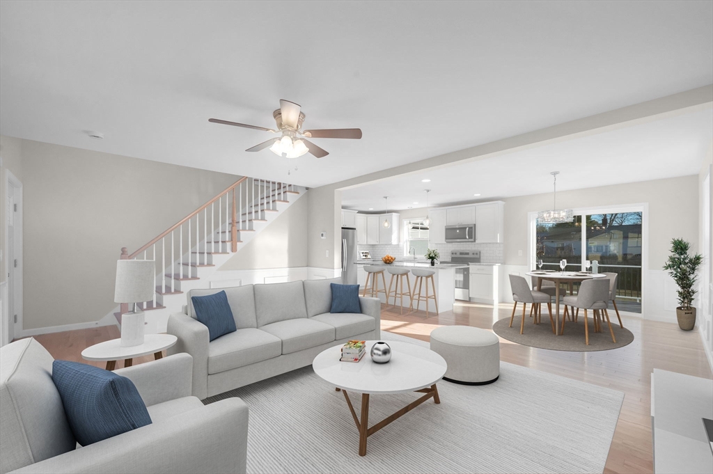 39 Wallace Street Springfield, MA 01119 - Photo 7 of 41 a living room with furniture and a large window