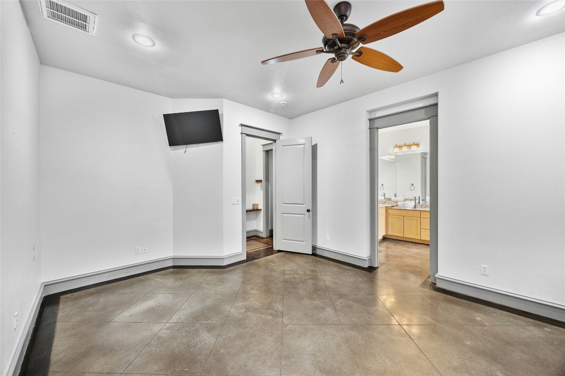 5617 Clay Avenue, Unit B Austin, TX 78756 - Photo 16 of 38 a view of a livingroom with a ceiling fan and entryway