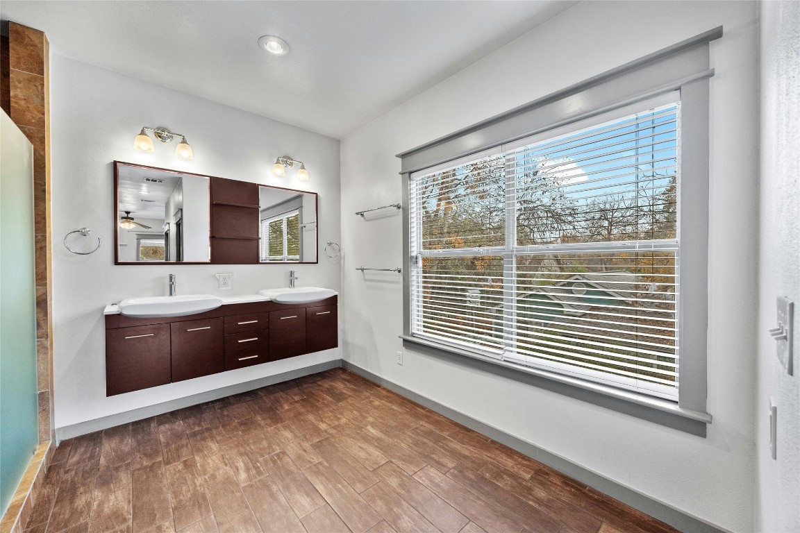5617 Clay Avenue, Unit B Austin, TX 78756 - Photo 24 of 38 a bedroom with a bed and a dresser