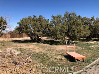 9350 White Road Phelan, CA 92371 - Photo 1 of 1 a backyard of a house with lots of green space