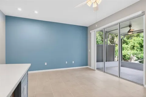 a view of a dining room with furniture and a livingroom