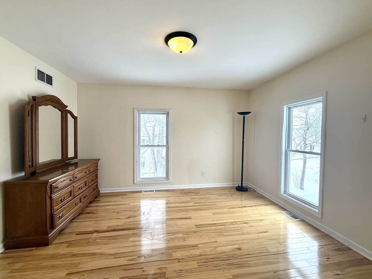 136 West Chestnut Street Compton, IL 61318 - Photo 12 of 24 a view of an empty room with window and wooden floor