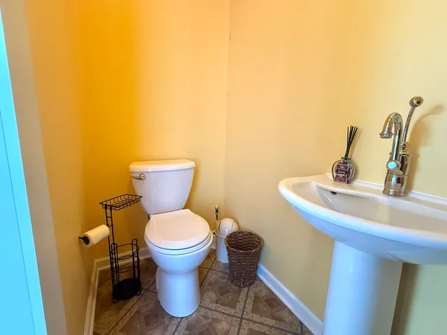 a bathroom with a sink and a toilet