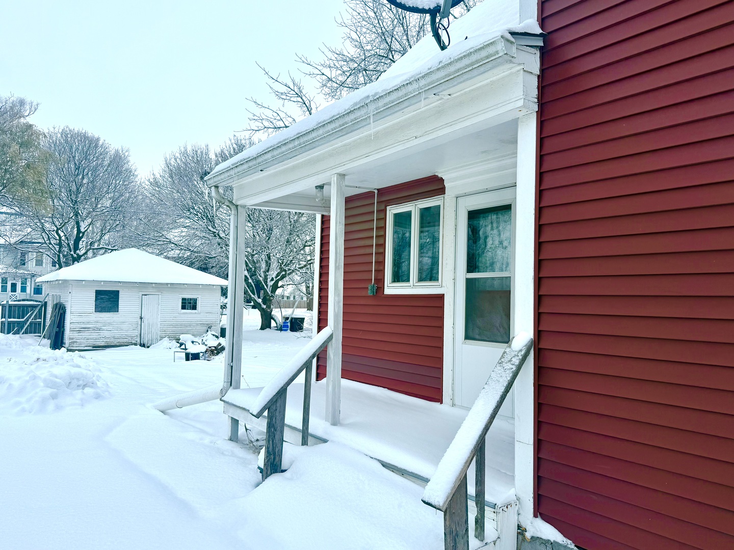 136 West Chestnut Street Compton, IL 61318 - Photo 22 of 24 a view of a patio with a table and chairs under an umbrella