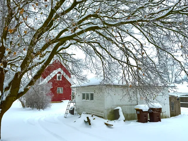 a front view of a house with parking yard