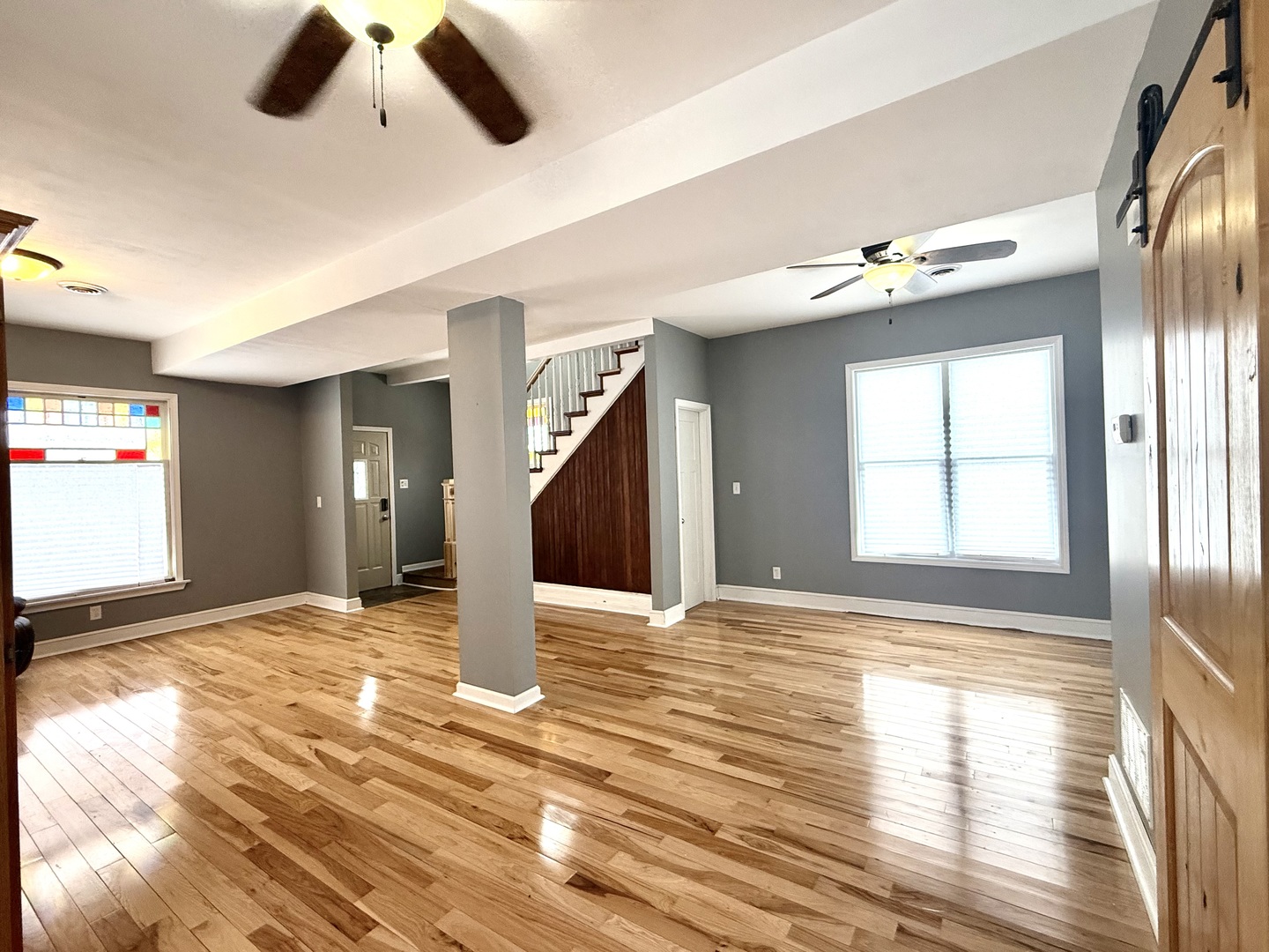 136 West Chestnut Street Compton, IL 61318 - Photo 4 of 24 a view of an empty room with window and wooden floor