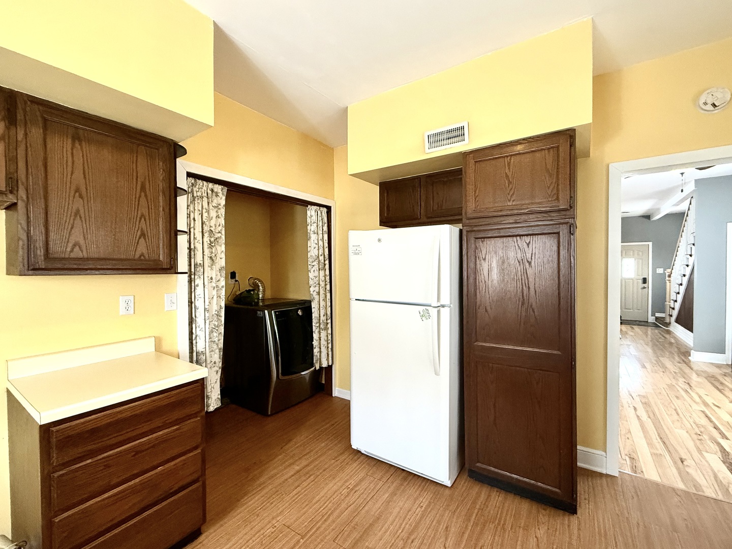 136 West Chestnut Street Compton, IL 61318 - Photo 10 of 24 a kitchen with a refrigerator and a stove