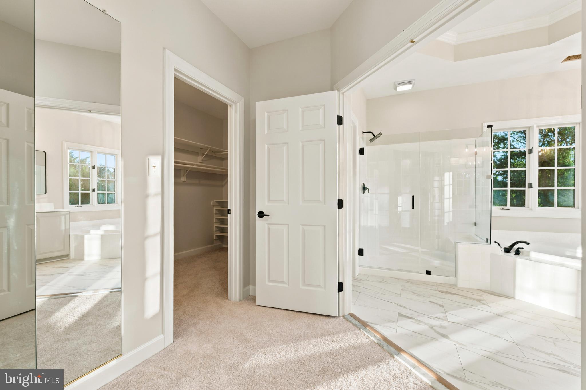 9313 Harrisons Farm Way Laytonsville, MD 20882 - Photo 36 of 77 a view of a bathroom with a shower