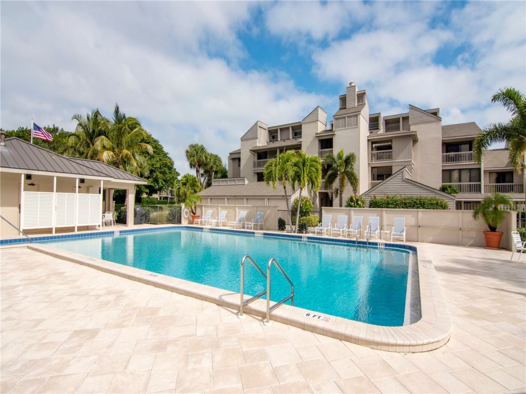 1880 Bay Road, Unit I319 Vero Beach, FL 32963 - Photo 25 of 36 a view of a house with a swimming pool