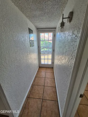 a view of an empty room with window