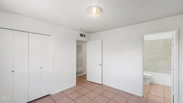 a view of an empty room with window