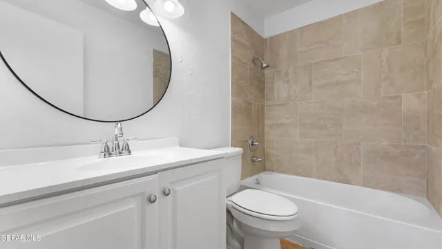 a view of a livingroom with an empty space and a window