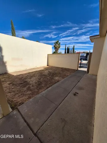 a view of a back yard of the house