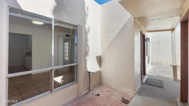 a view of an empty room and window