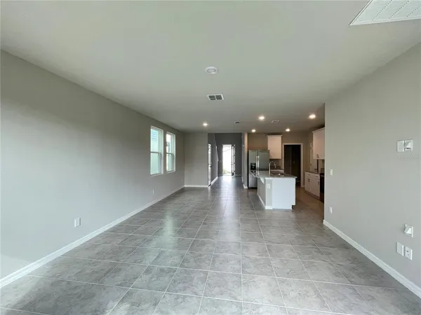a view of a kitchen and a window