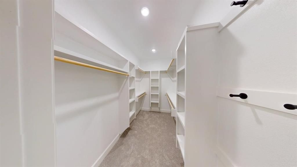 2509 Windmill Lane Longview, TX 75601 - Photo 10 of 35 Spacious closet featuring carpet flooring