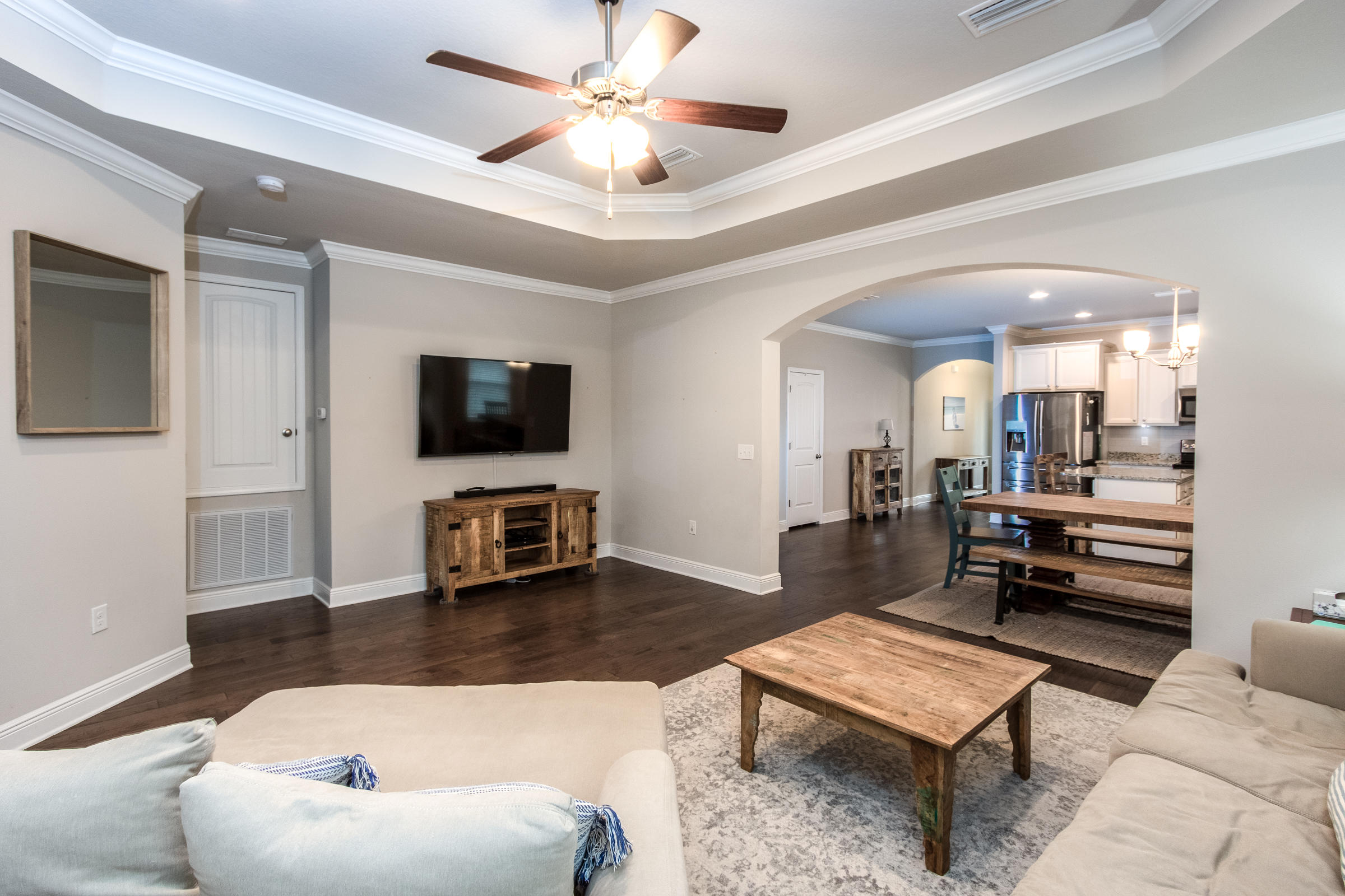 196 Pin Oak Loop Santa Rosa Beach, FL 32459 - Photo 14 of 34 a living room with furniture and a flat screen tv